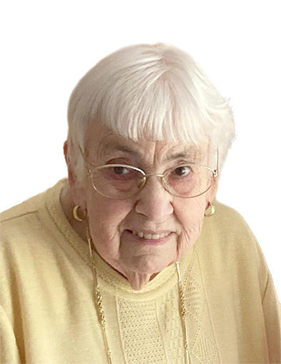 Portr&auml;t einer &auml;lteren Frau mit kurzen, wei&szlig;en Haaren und Brille, die in einem hellgelben Pullover l&auml;chelt.