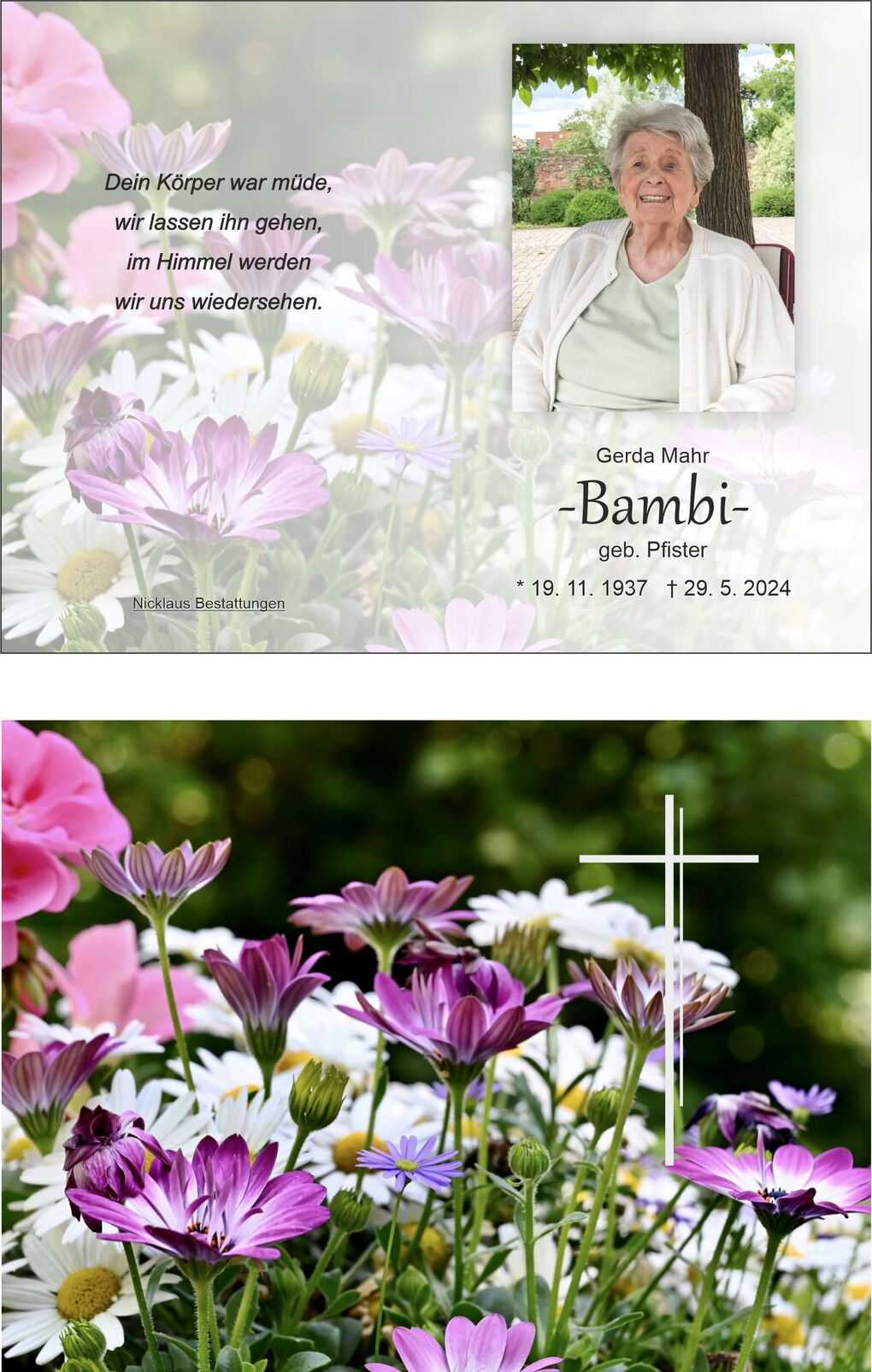 Bl&uuml;hende Blumen in lila und wei&szlig;, mit einem wei&szlig;en Kreuz im Hintergrund, das Trost und Erinnerung symbolisiert.