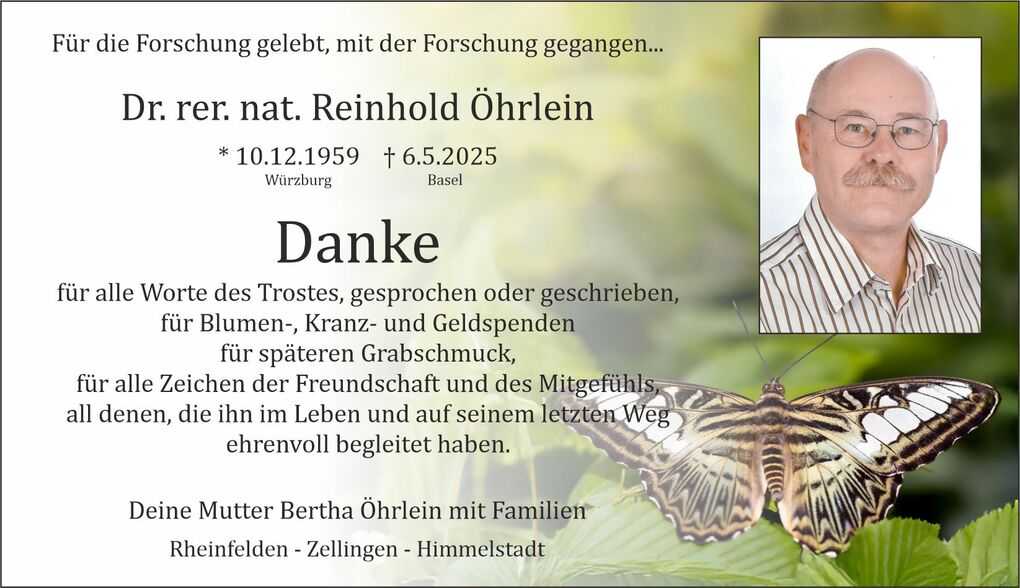 Traueranzeige f&uuml;r Dr. Reinhold &Ouml;hrlein mit Foto und Danksagung, umgeben von einer floralen Hintergrundgestaltung.