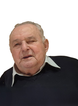 Nahaufnahme eines &auml;lteren Mannes mit grauen Haaren, der freundlich in die Kamera schaut. Er tr&auml;gt einen schwarzen Pullover.