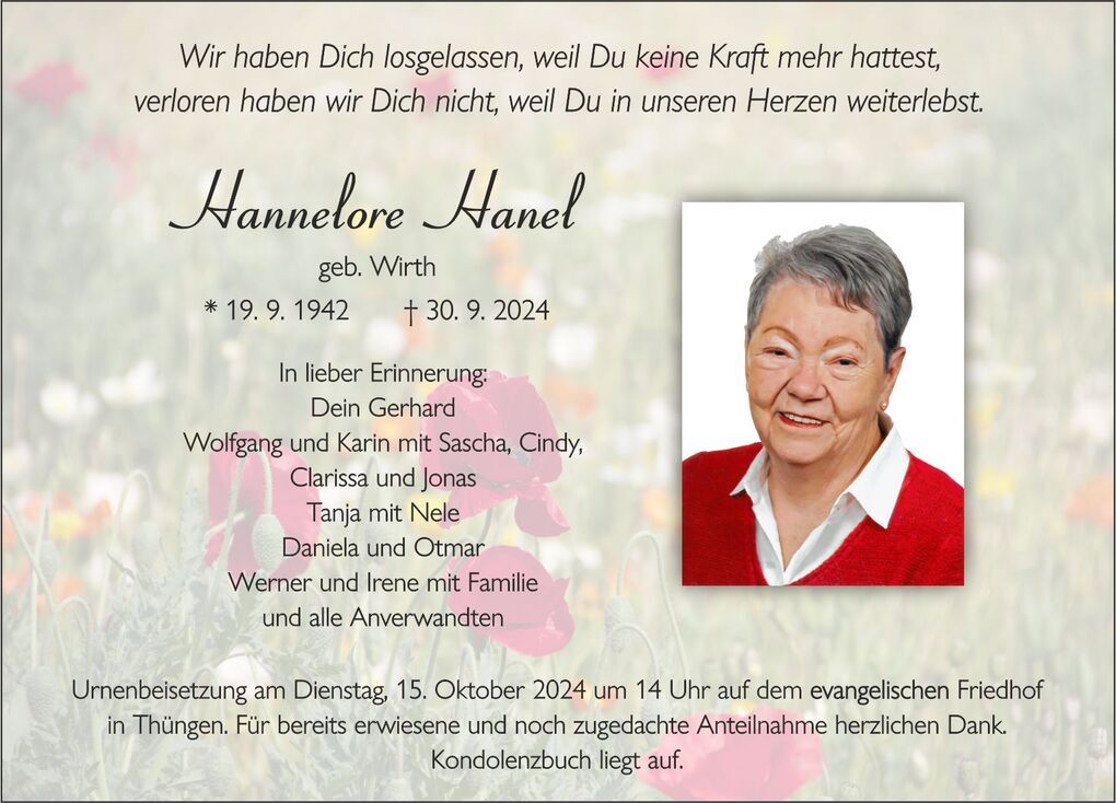 Erinnerungskarte mit Foto von Hannelore Hanel, dato und Grabzeit, umrahmt von bunten Blumen im Hintergrund.