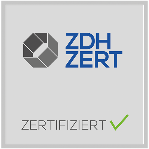 Logo der ZDH Zertifizierung auf grauem Hintergrund mit dem Wort "ZERTIFIZIERT" und einem Häkchen.
